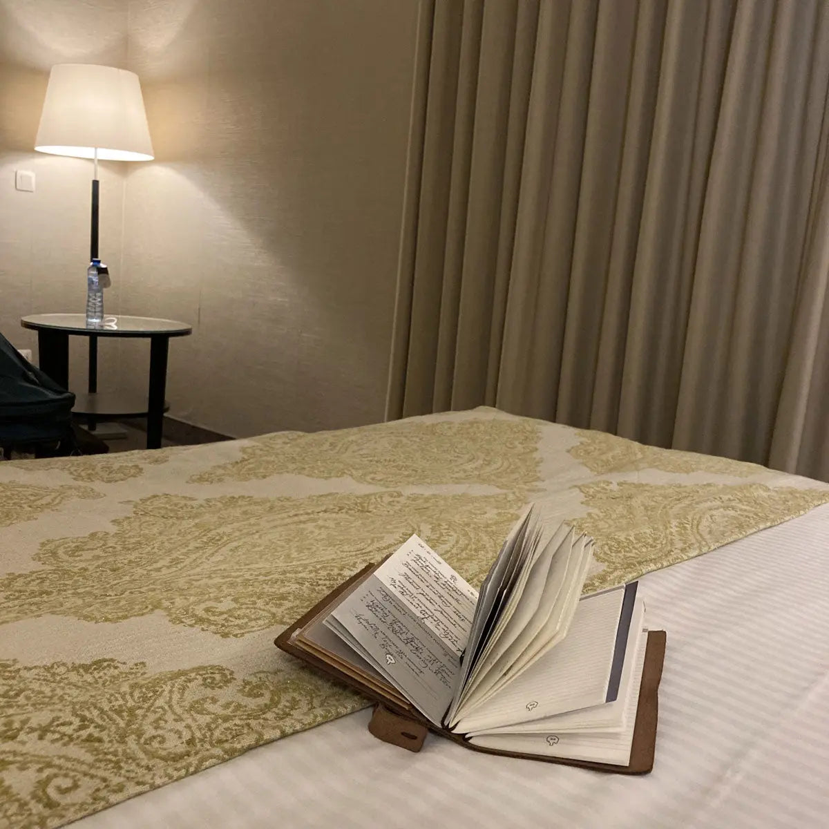 Filling out Little Hunterman's Wee-Journal (s a refill) while traveling through Belgium.