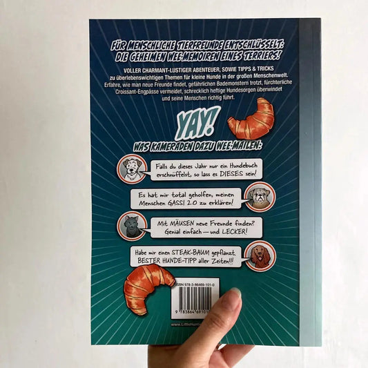 Die große Welt des kleinen Huntermann, die lustigen Hundememoiren eines kleinen Terriers, von Hunter Lassal. Premium Paperback mit Schwarz-Weiß-Druck auf weißem Papier - Rückansicht mit hellem Hintergrund