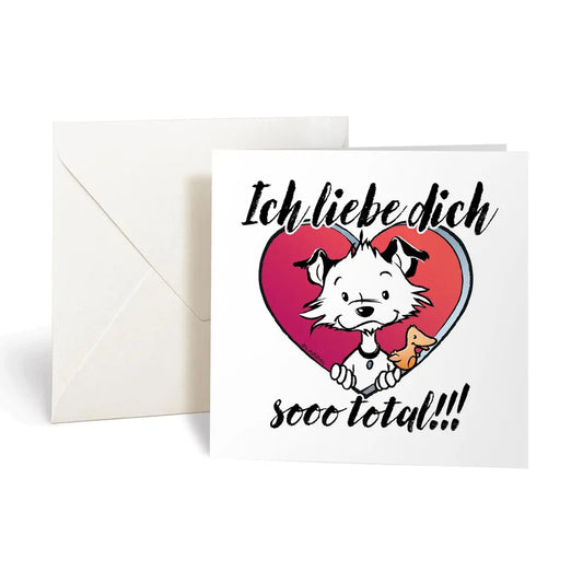 Front of square Little Hunterman card showing him and Flynn looking out of a big red heart with large text saying in German: Ich liebe dich sooo total!!! With card and envelope standing on a white surface.