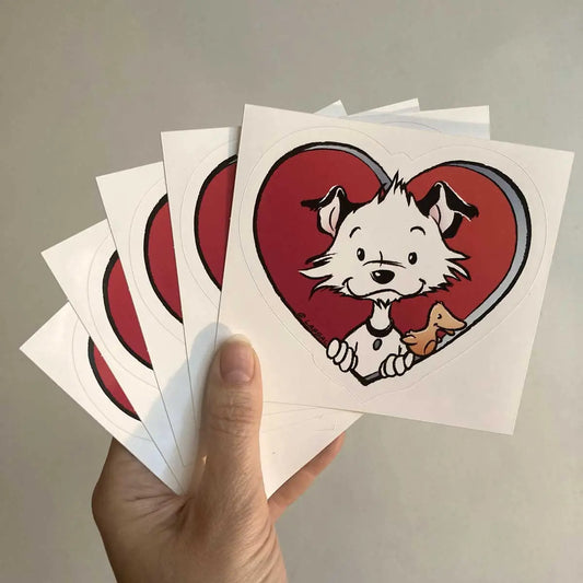Image shows a hand holding a set of five of Little Hunterman's "Sticky Doggie Love" stickers in front of a light background.