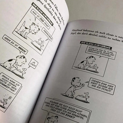 Die große Welt des kleinen Huntermann, die lustigen Hundememoiren eines kleinen Terriers, von Hunter Lassal. Premiumausgabe mit Schwarz-Weiß-Druck auf weißem Papier - aufgeschlagenes Buch mit Contentansicht auf hellem Hintergrund