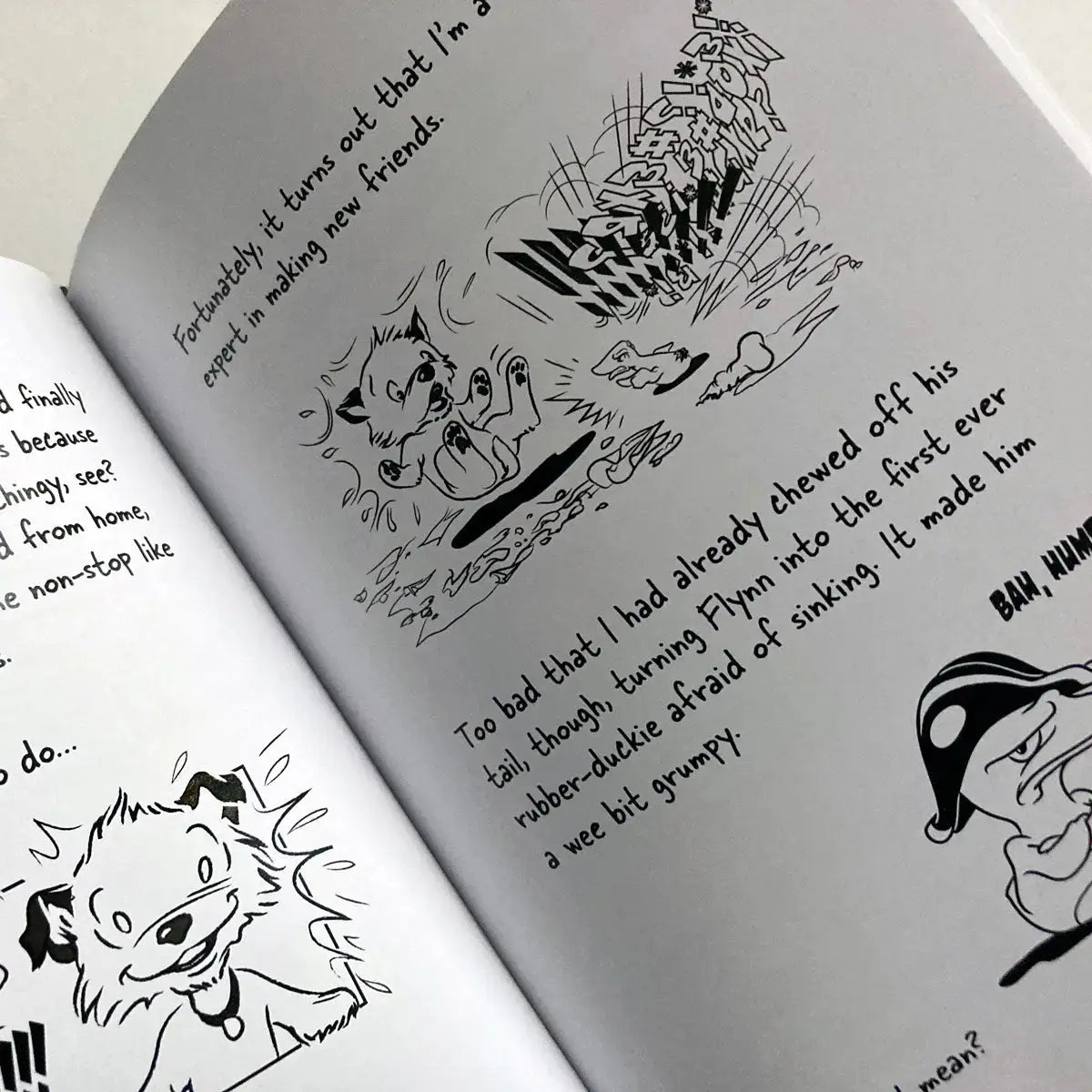 The Big World According to Little Hunterman  - now as a beautiful premium print version on white paper (Hardcove & Paperback). The image shows an open book with white pages, text, and black-and-white illustrations.