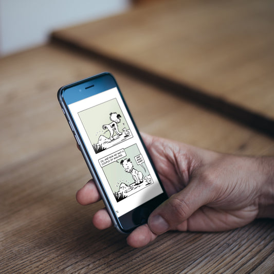 The Big World According to Little Hunterman CROISSANT edition ebook. Heartwarming and funny: An illustrated dog book about a little Parson Russell terrier's adventures in the human world. Perfect for dog lovers of any age. This pictures shows someone reading the book on a phone.
